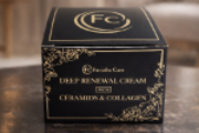 Facialia Care Deep Renewal Cream box on a marble surface with blurred background
