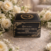 Faciala Care Deep Renewal Cream box surrounded by white flowers on a textured surface.
